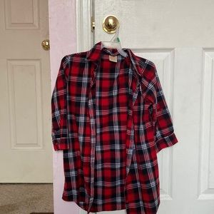 This flannel has half sleeves and is a size 10-12